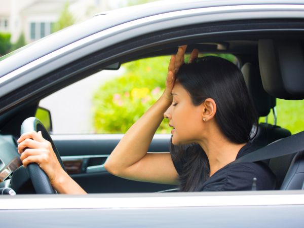 Upset Woman in a Rental Car